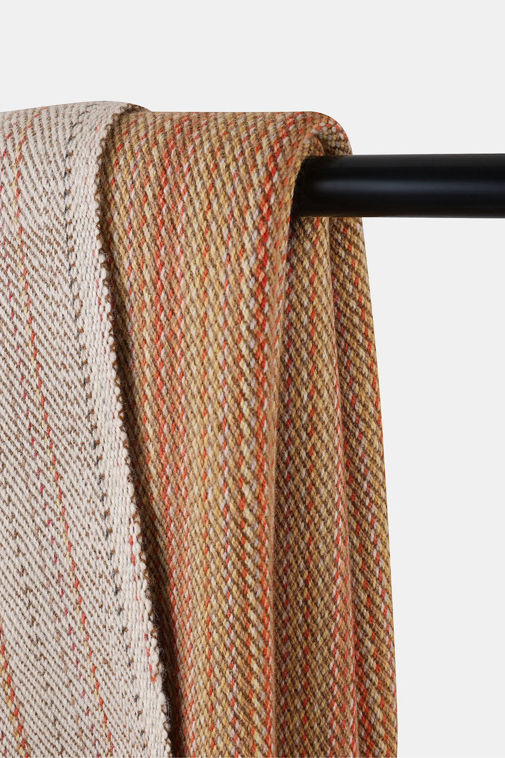 Woven Alchi Apricot Wool Throw in warm earthy shades