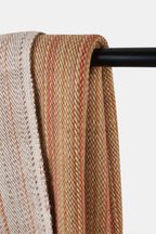 Woven Alchi Apricot Wool Throw in warm earthy shades