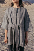 Choya Wear in pure wool with relaxed silhouette and wide sleeves