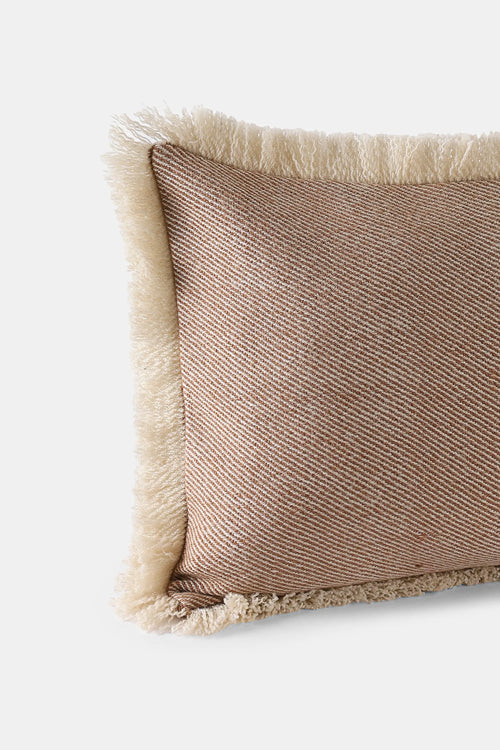 Rectangular Khardung Mist cushion with walnut-dyed yarn and fringed edges