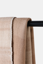 Woven wool Khardung Mist Throw with natural textured herringbone pattern