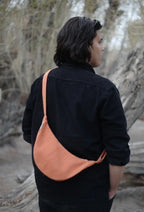 Manjis Crossbody Bag showcasing handwoven wool and madder-dyed weave