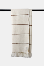 Natural white Nubra Dunes Wool Throw with walnut-dyed stripes