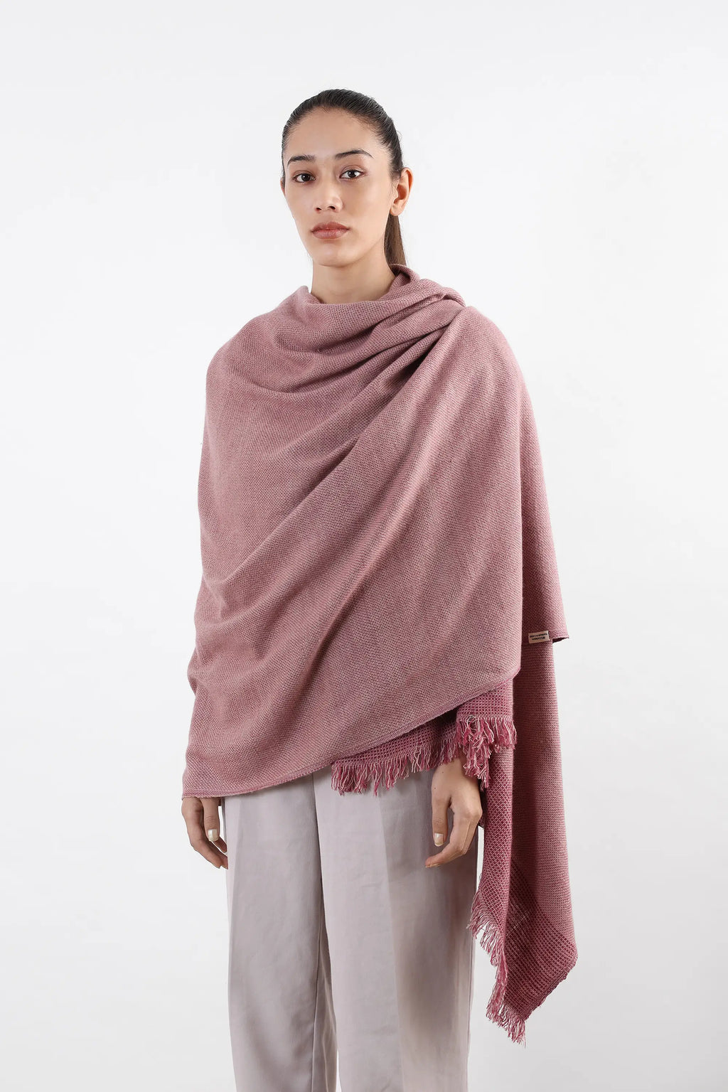 Pink Puga Pashmina Shawl with fringed edges and natural woven texture