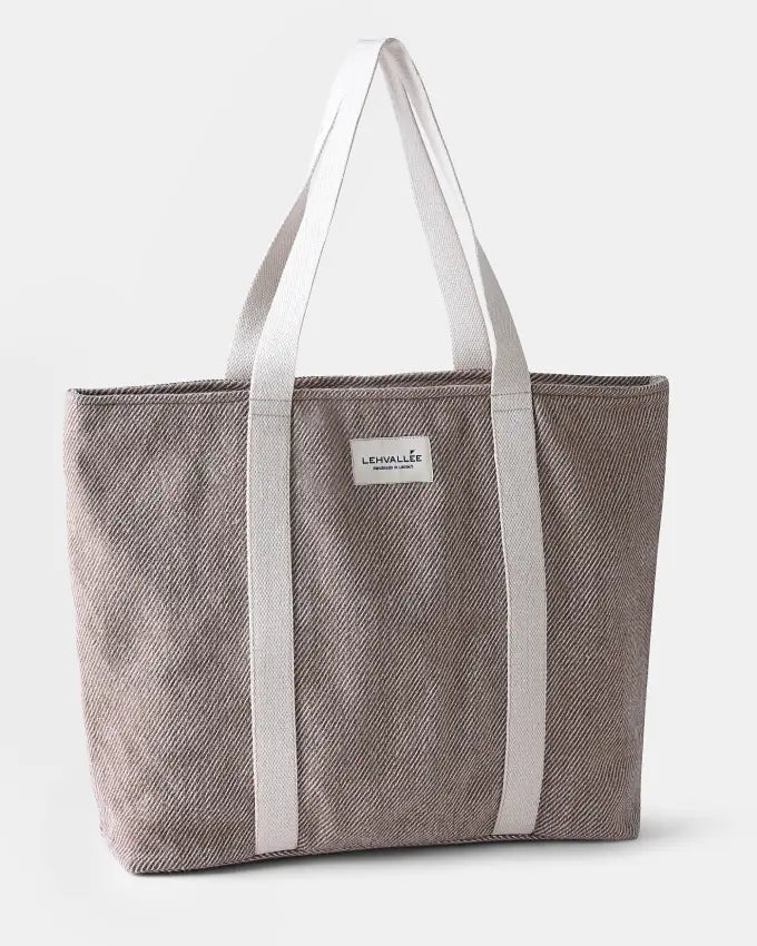 Ri Travel Bag in natural white and walnut brown handwoven wool