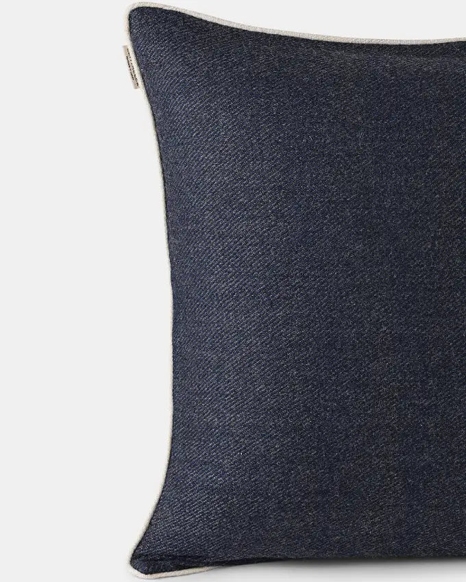 Handwoven Shey Sunset Black wool cushion cover with contrasting white piping